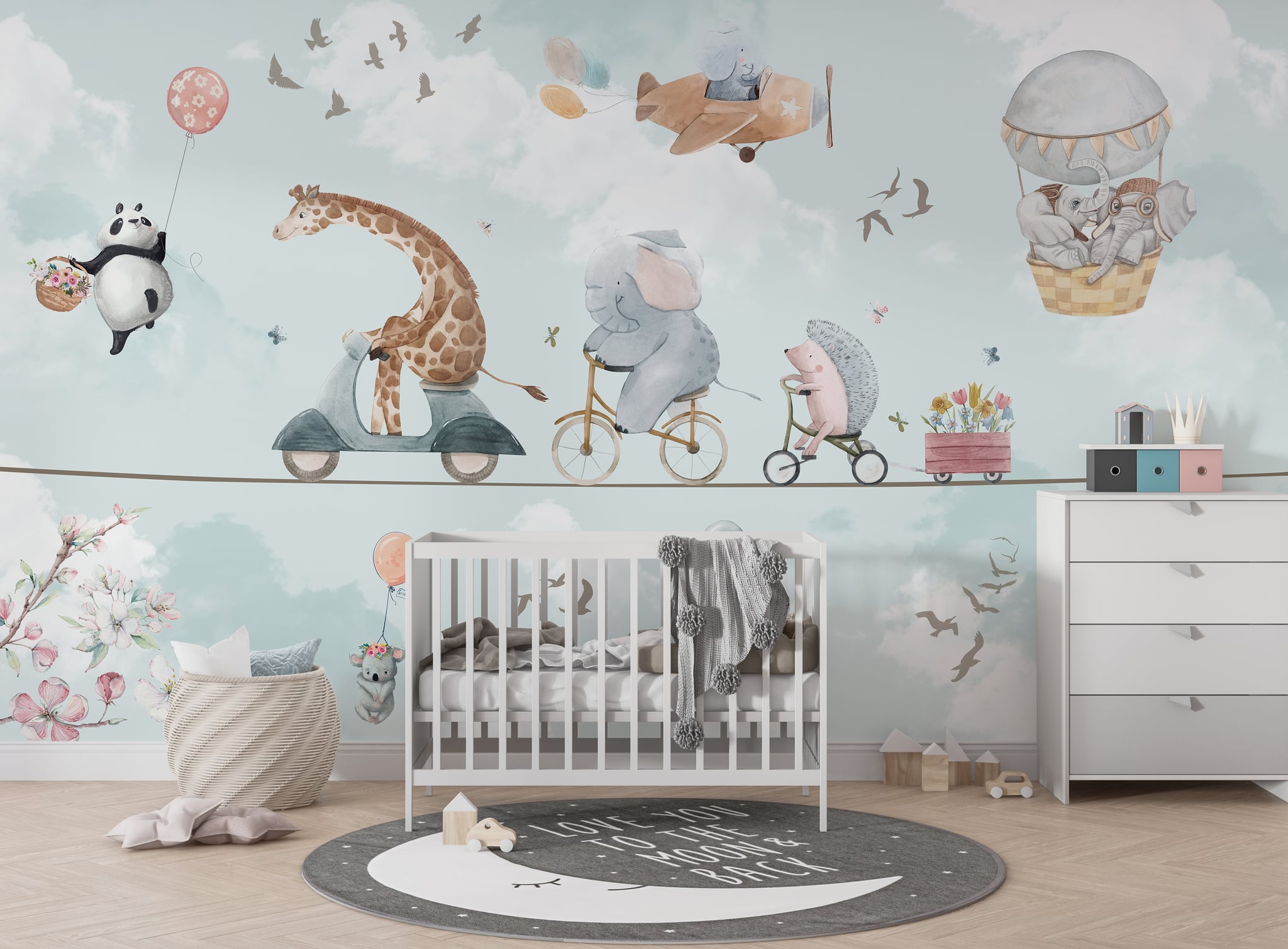 Safari nursery mural with a giraffe riding a scooter, elephant on a bicycle, and hedgehog traveling on a tricycle