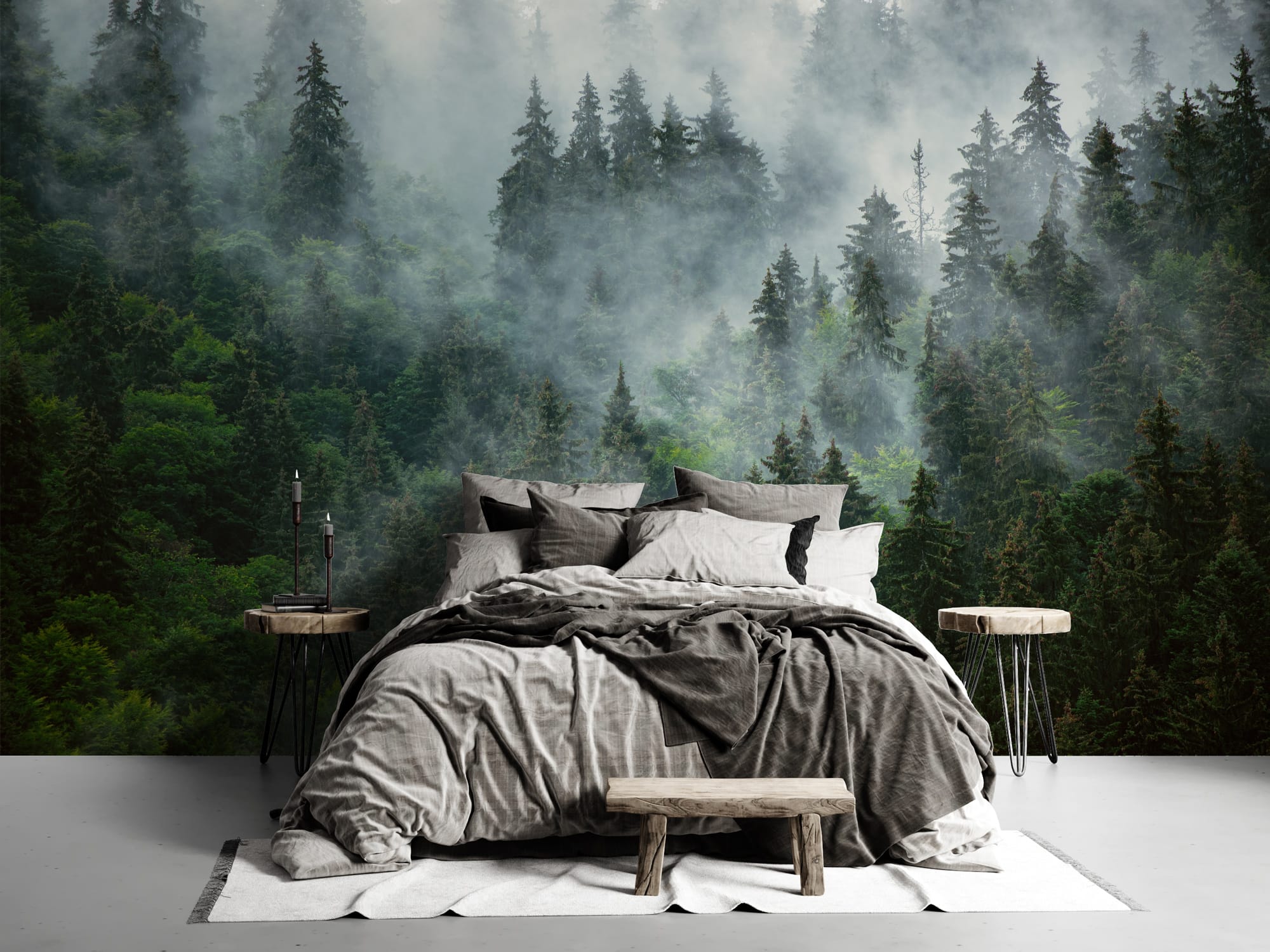 Misty pine forest wallpaper wall mural with dense evergreen trees and atmospheric mountain fog behind a modern bed