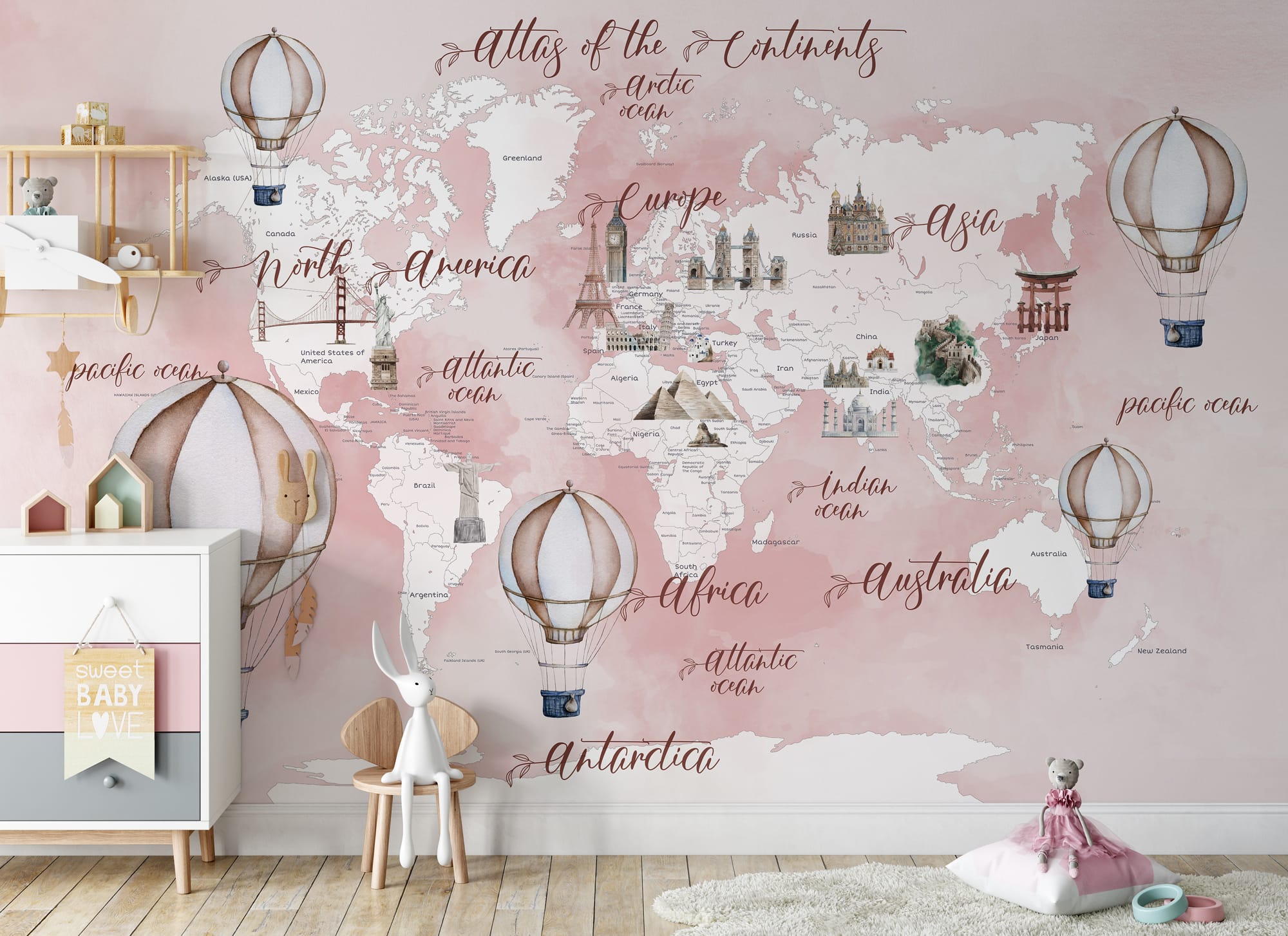 Girls room world map mural in soft blush pink tones