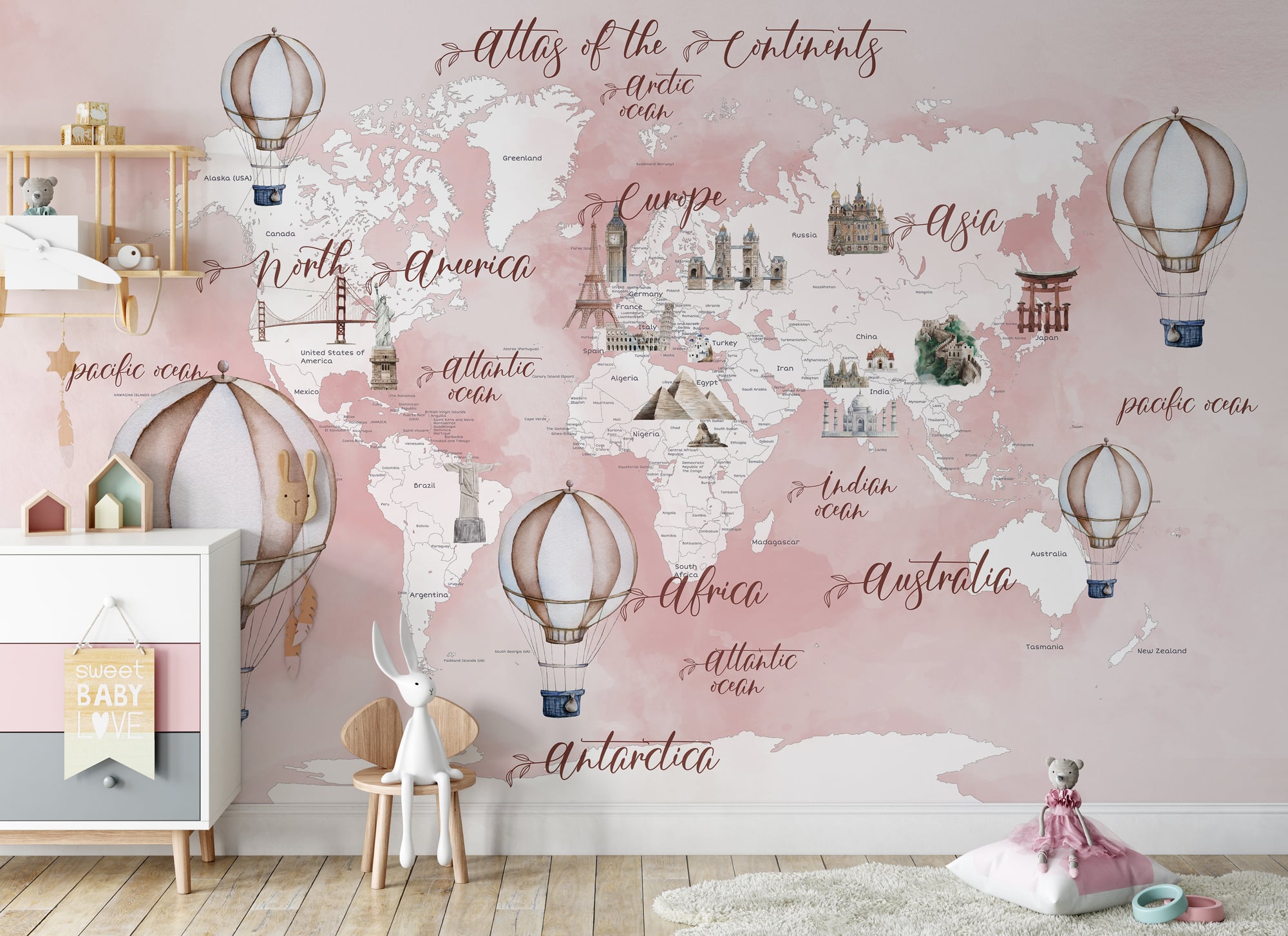 Girls room world map mural in soft blush pink tones