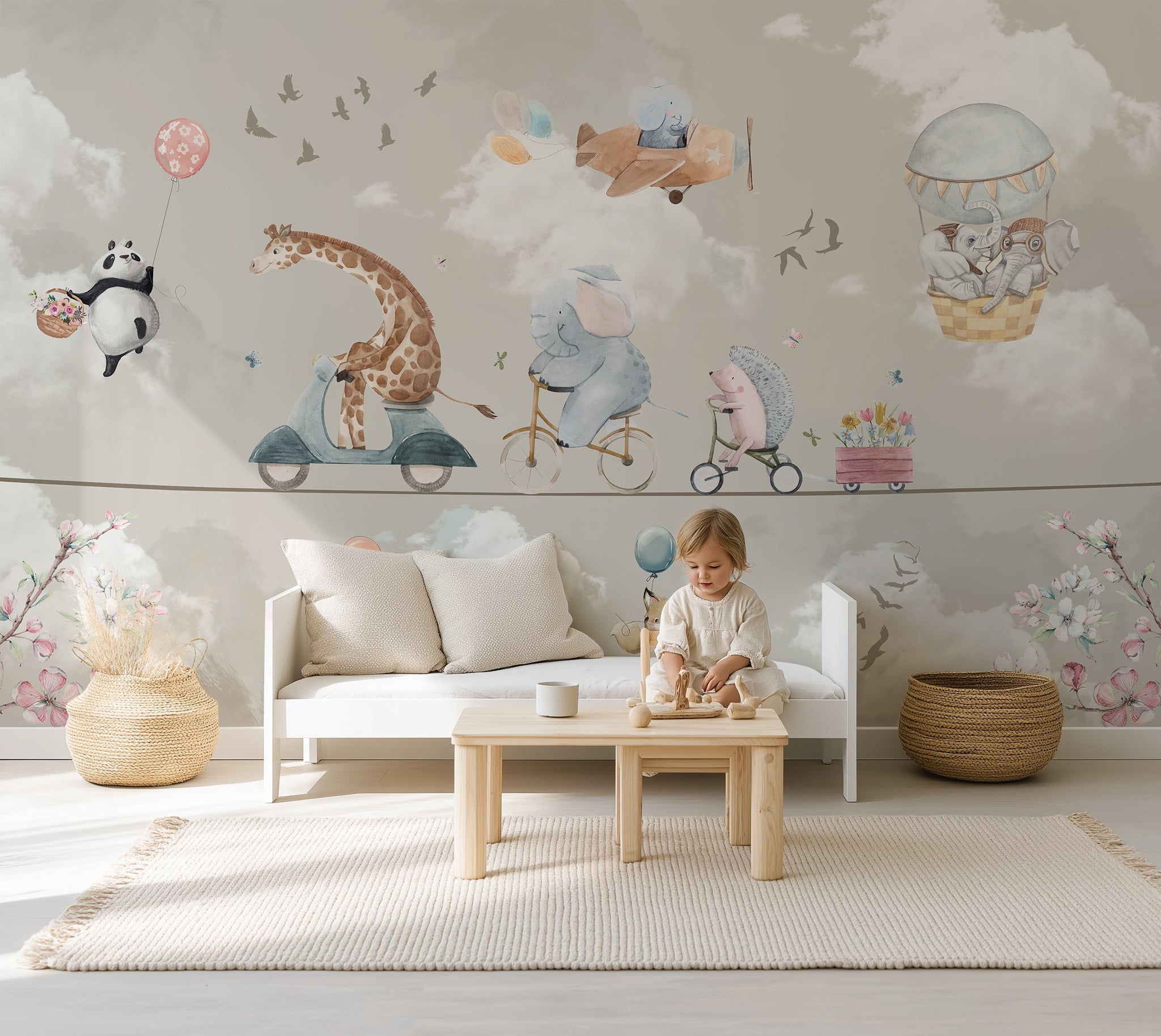 Safari nursery mural featuring a giraffe riding a scooter, elephant on a bicycle and hedgehog on a tricycle
