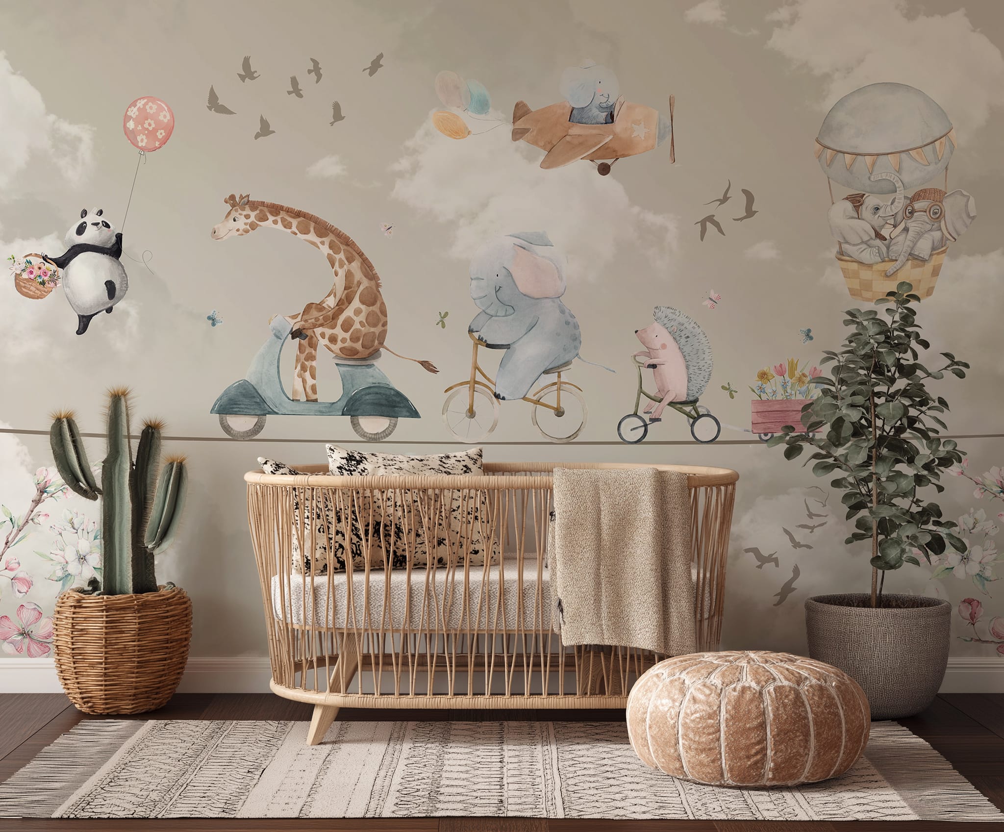 Watercolor animal nursery wallpaper with giraffe, elephant, panda and hot air balloon behind a rattan crib